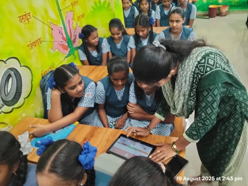 Students using EduSoulX educational tablets in class